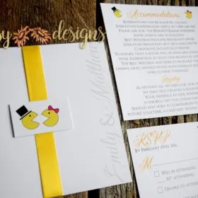 mr. and mrs. pacman wedding invitation and rsvp with matching ribbon and monogram