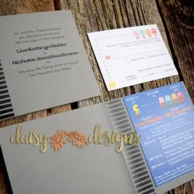 mr. and mrs. pacman wedding invitation and rsvp in a 1980's game cartridge styled tent-fold