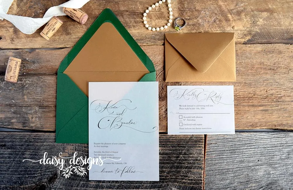 Simply Sophia invite on vellum with green envelope and gold liner and gold rsvp envelope