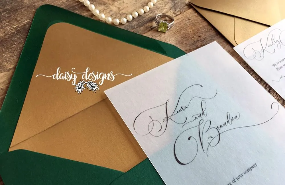 Simply Sophia invite on vellum with green envelope and gold liner