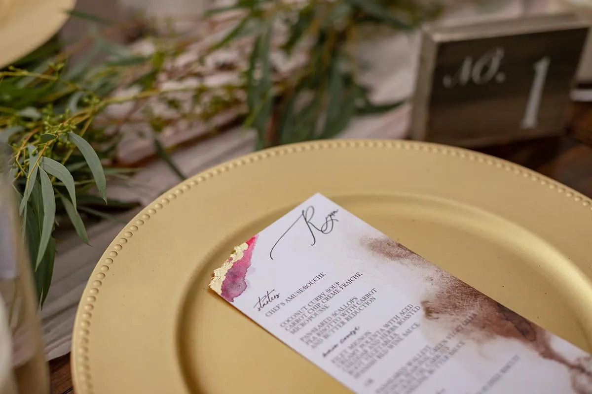 Venosta gold-trimmed menu