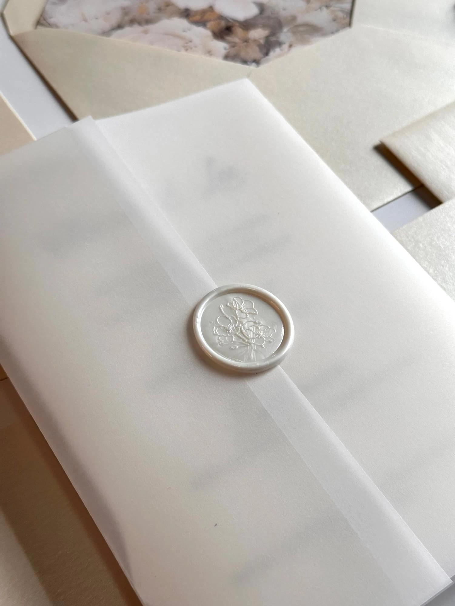 Olivia invite wrapped in vellum